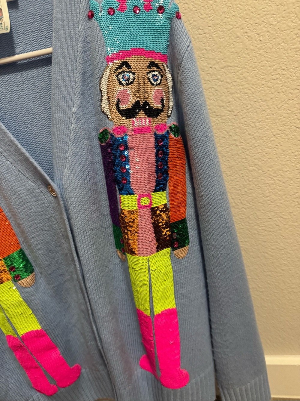 Light Blue Cardigan Sweater with Colorful Nutcracker Sequin Design - Picture 4 of 9